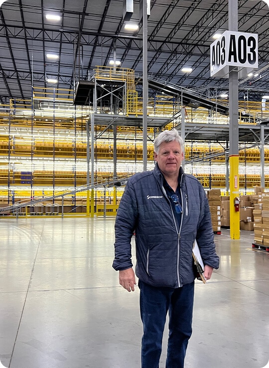 Warehouse interior with storage racks.