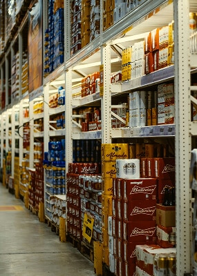 Aisles filled with beer cans.