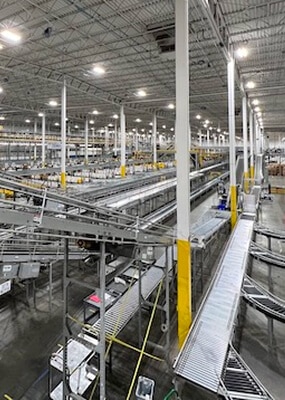 Large industrial warehouse with conveyor belts