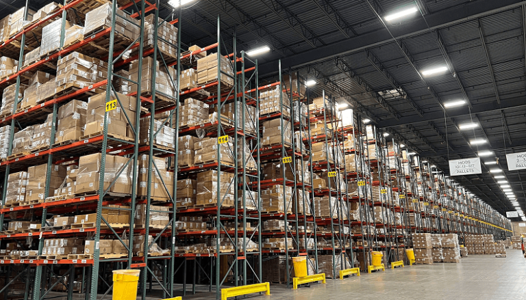 Large warehouse filled with stacked boxes
