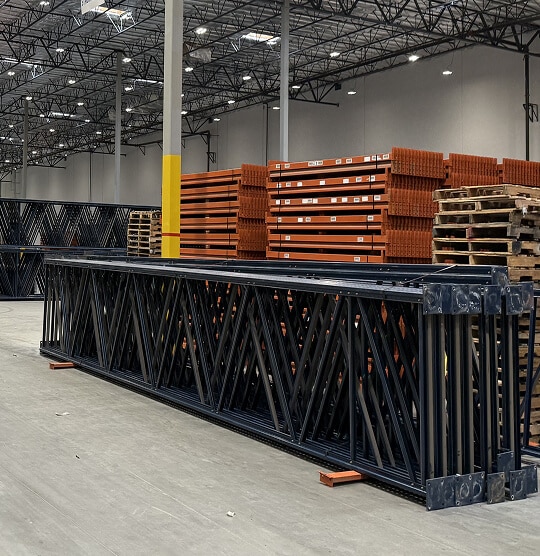 Warehouse with stacked pallets and racks