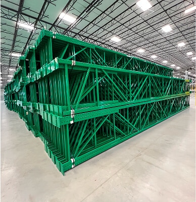 Green industrial shelving units stacked