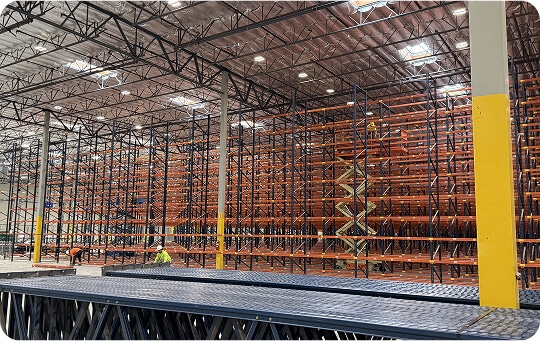 Large warehouse with empty shelving units