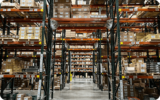 Large warehouse filled with stacked boxes