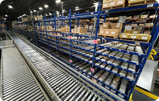 Warehouse with conveyor and shelving units