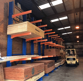 Wooden boards stacked in warehouse