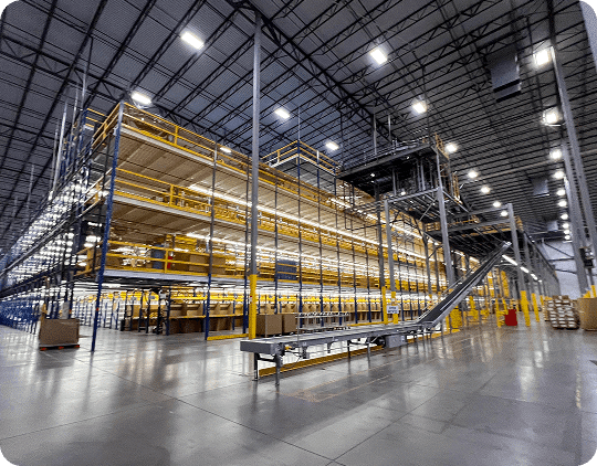 Large warehouse with shelving and conveyor