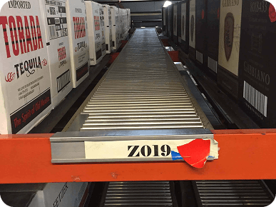 Empty shelf with tequila boxes