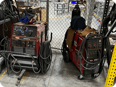 Two welding machines with cables