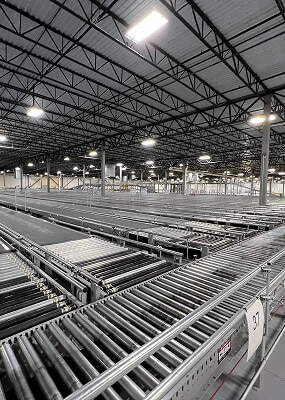 Large warehouse with conveyor systems