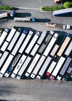 Aerial view of parked trucks.