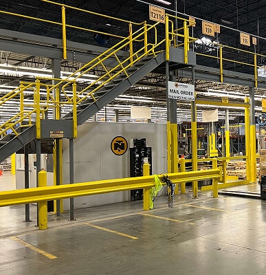 Industrial mezzanine with yellow railings