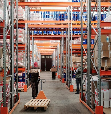 Warehouse with workers and pallets