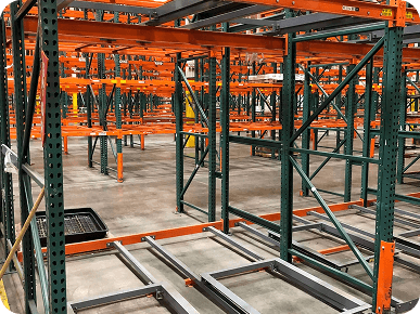 Empty industrial shelving units arranged