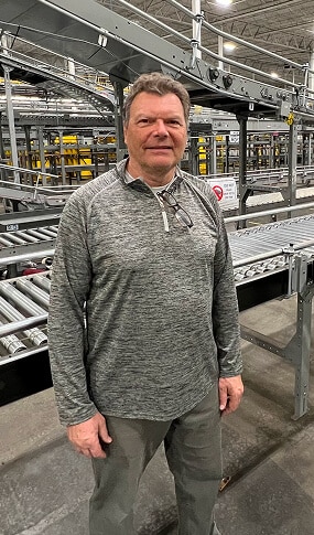 Man standing in industrial setting