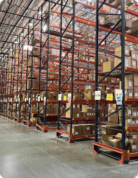 Warehouse filled with stacked cardboard boxes