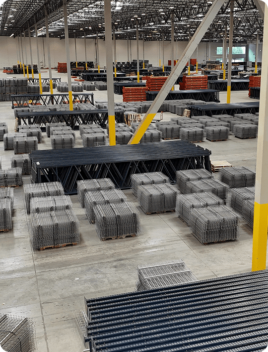 Large warehouse filled with stacked materials.