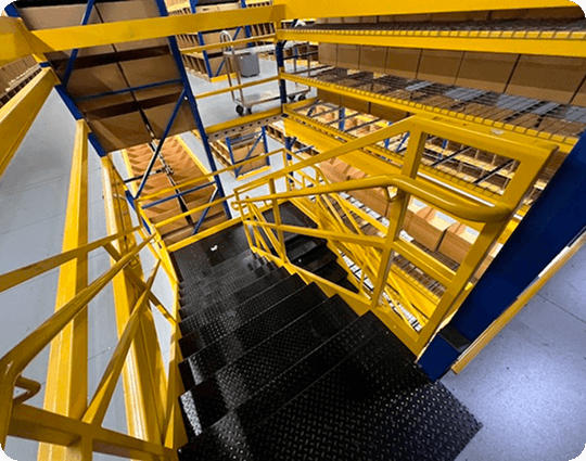 Yellow stairs in a warehouse mezzanine