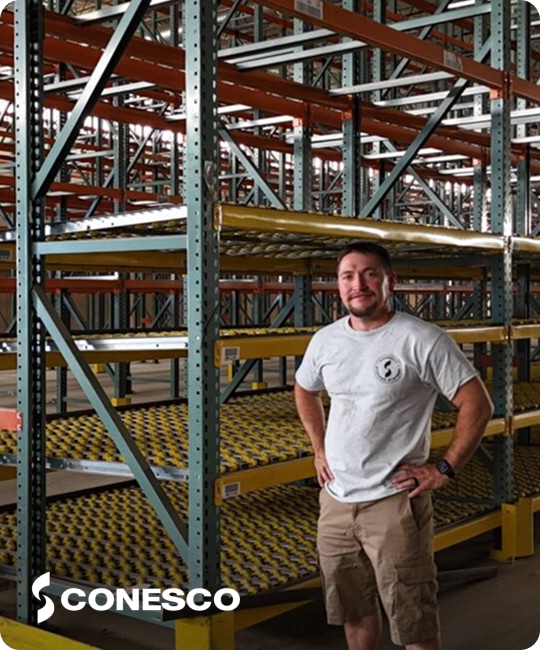 Warehouse with shelving and equipment.