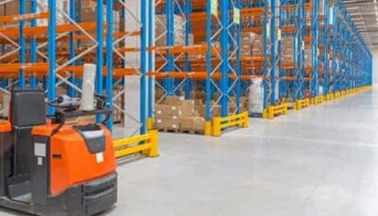 Warehouse with shelves and forklift