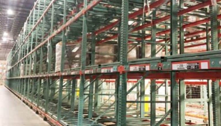 Empty industrial shelving units arranged neatly