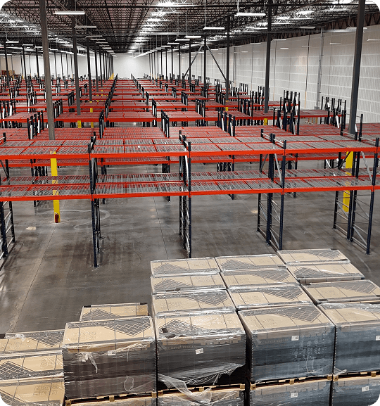 Empty warehouse with stacked pallets
