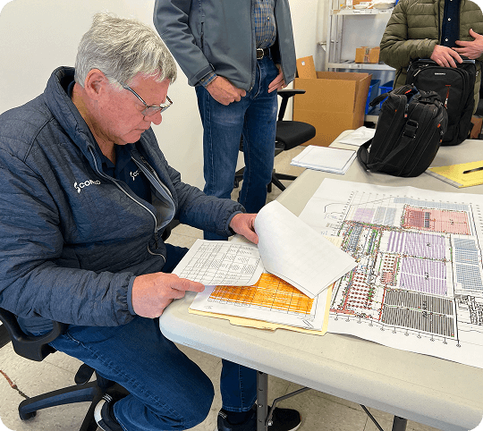 Analyzing documents at a meeting.