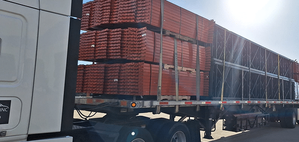 Truck loaded with stacked materials