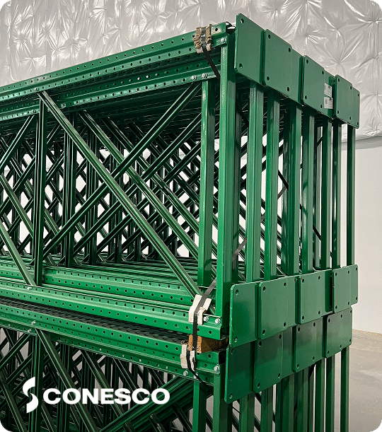 Green metal shelving units stacked neatly.