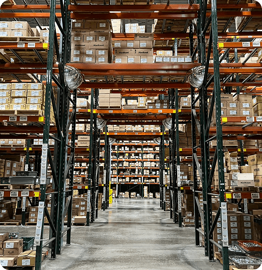 Large warehouse filled with stacked boxes